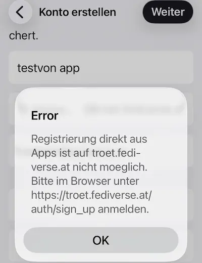 Screenshot of the Mastodon iOS app with an error dialogue reading, in German: “Registrierung direkt aus Apps ist auf troet.fediverse.at nicht moeglich. Bitte im Browser unter https://troet.fediverse.at/auth/sign_up anmelden.” — registration directly from apps is not possible on troet.fediverse.at, please sign up in the browser.